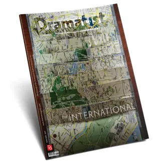 International Issue Cover: Various city maps layered on top of each other.