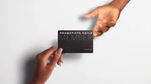 a photograph of a hand holding a DG membership card and passing it to another person's hand